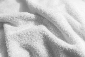 what causes mildew smell in towels